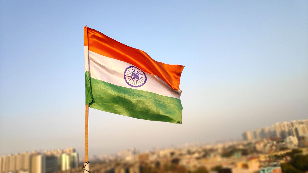 India flag over skyline